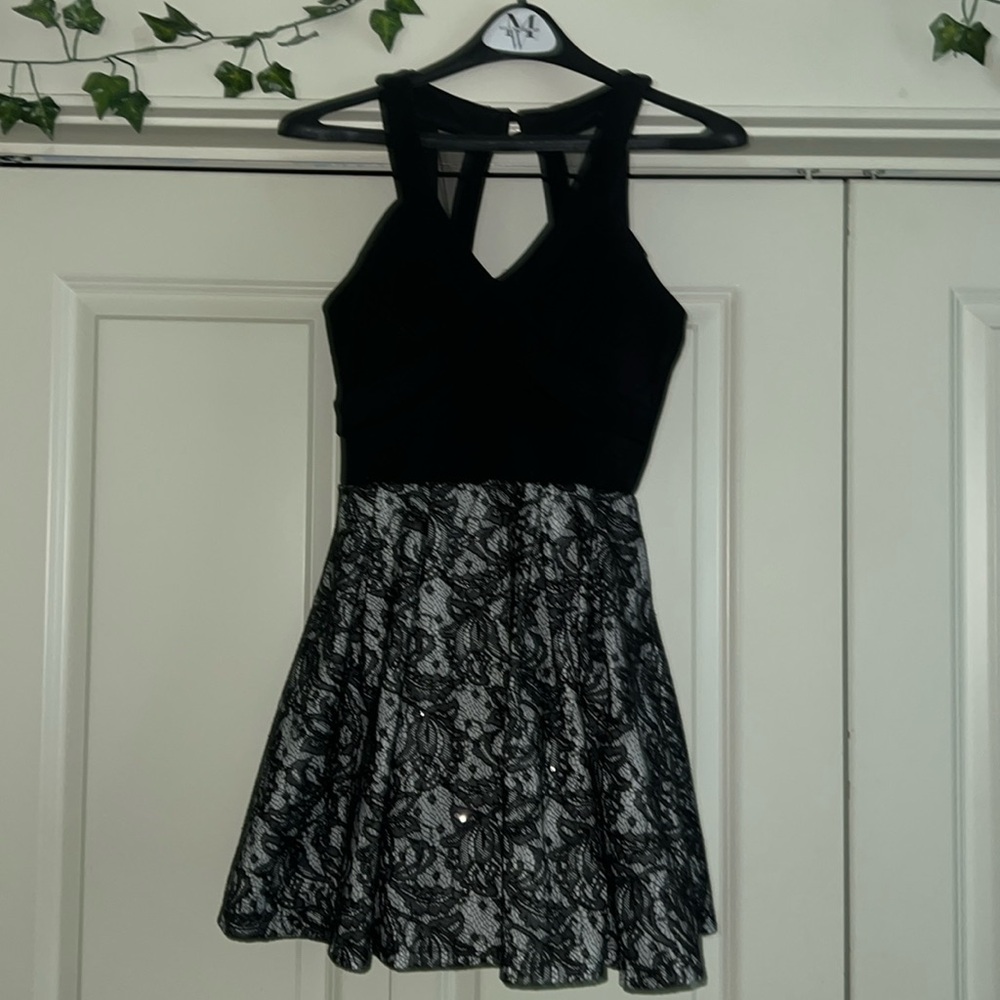 Beautiful short formal dress by Crystal Doll. No stains or tear. Worn once.
